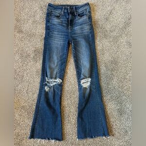 American eagle super stretch highest rise flare jeans with knee rips